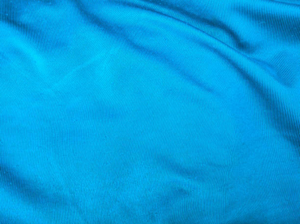 istock Soft blue satin background. for design background cloth, fabric, template. blurry. wavy 1622074446