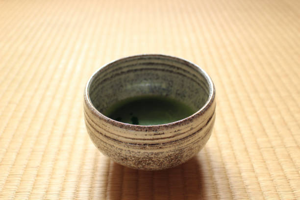 istock Matcha Japanese green tea cup on tatami mat 1622077522