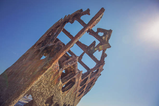 The tourist destination of the rustic hull of the Peter Iredale, shipwrecked on the Oregon coast in 1906, remains photogenic.