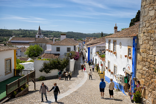 Tourists at village of Obidos, Portugal