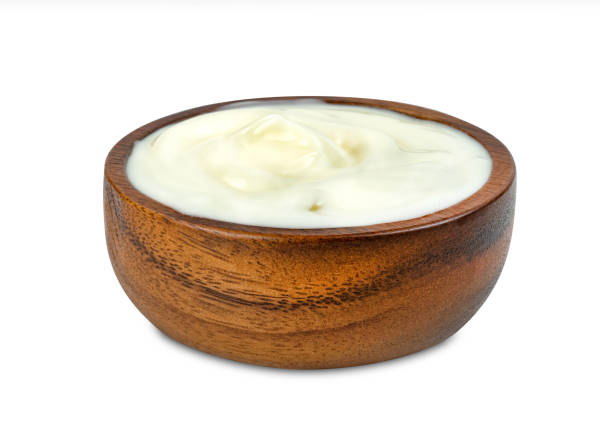 istock yoghurt with nata de coco dutche in wooden bowl isolated on white background ,include clipping path 1622131783