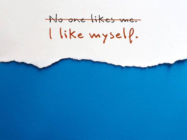 istock Torn paper on coly space blue background with handwritten text NO ONE LIKES ME changed to I LIKE MYSELF - concept of develop growth mindset and turning negative self-talk into positive affirmation 1622168699