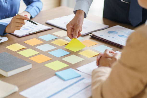 istock Business People brainstorming Meeting Design Ideas use post it notes to share idea professional investor start up project business brainstorming planning in office 1622173686