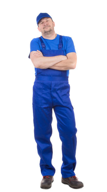 istock A man in a blue jumpsuit keeps his arms crossed on his chest. 1622173873