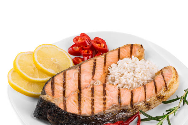 istock Grilled salmon steak with vegetables on a plate. 1622173896