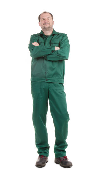 istock A worker in overalls keeps his arms crossed on his chest. 1622173937