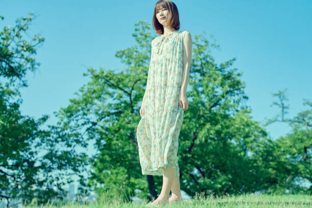 istock Young woman walking in a green space 1622213403