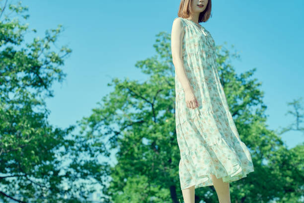 istock Young woman walking in a green space 1622216062