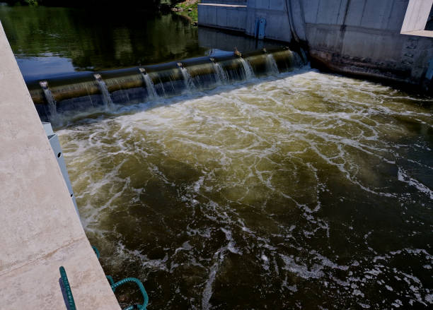 istock dangerous weirs with cylindrical overflows. an eddy on the water with bubbles causes the drowning of paddlers in boats and canoes. it is better to carry and go around this technical structure 1622225503