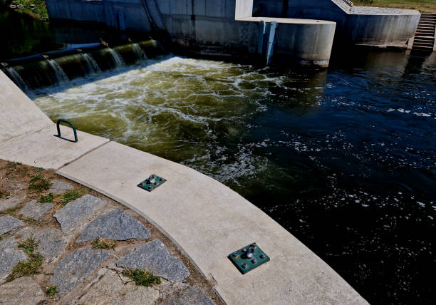 istock dangerous weirs with cylindrical overflows. an eddy on the water with bubbles causes the drowning of paddlers in boats and canoes. it is better to carry and go around this technical structure 1622225504