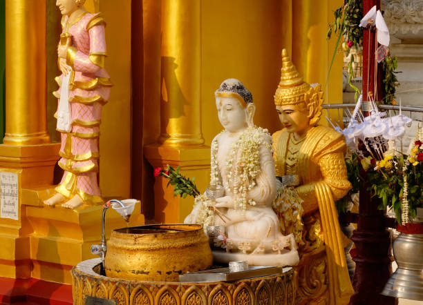 Buddha statues at Shwedagon Pagoda in Yangon, Myanmar. The Shwedagon Pagoda is one of the most famous pagodas in the world.