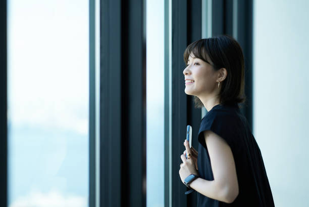 istock Young woman looking at the view 1622282824