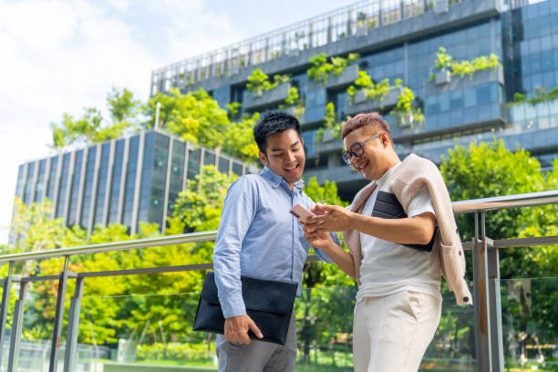 istock Asian business people working together outside office. 1622299983