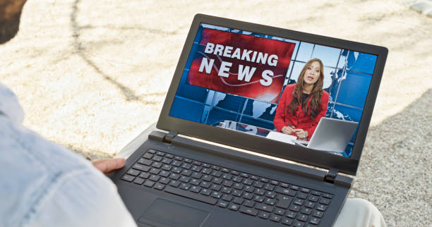 istock Man watching news on laptop 1622301590