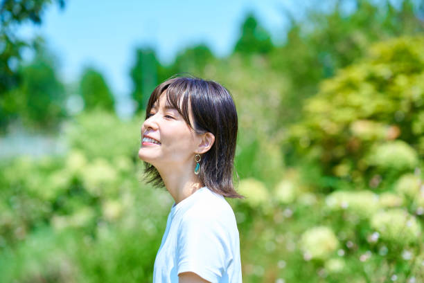 istock Woman relaxing in green space 1622308809