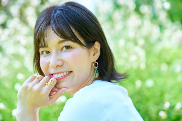 istock Woman relaxing in green space 1622314701