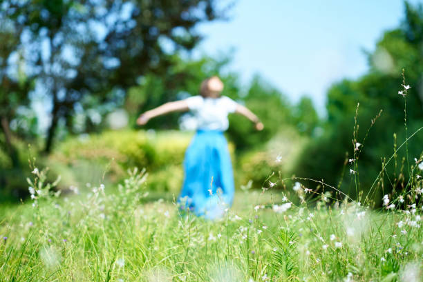 istock Woman relaxing in green space 1622322111