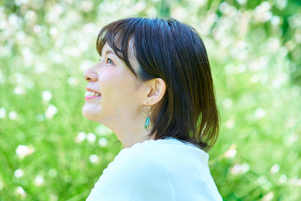 istock Woman relaxing in green space 1622323712