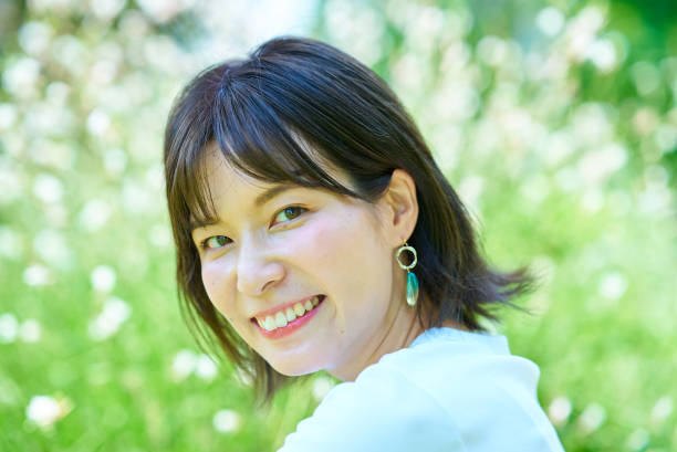 istock Woman relaxing in green space 1622324759