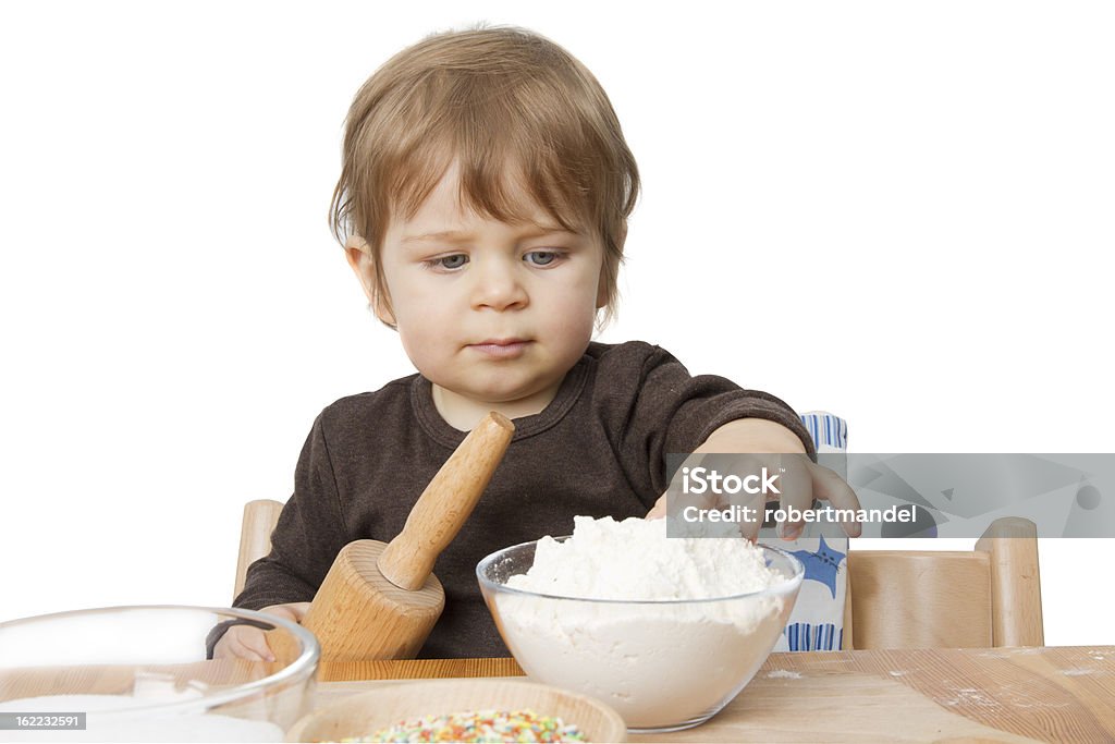 Christmas Bakery Little boy is baking for christmas cakes. Advent Stock Photo