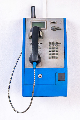 Old public phone, widely used in the past and outdated after the technology of cell phones came into our lives