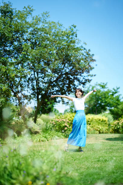 istock Woman relaxing in green space 1622329070