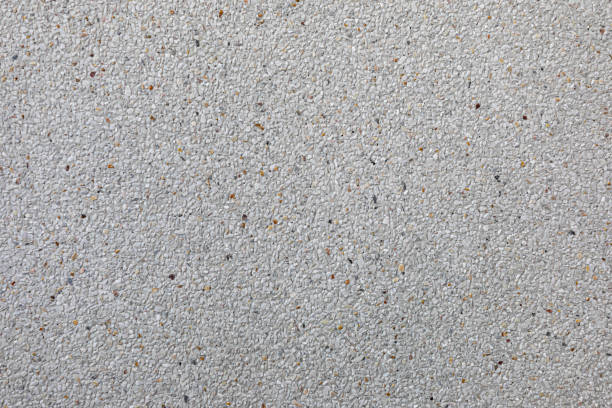 istock Texture washed sand background.Wall made from fine and coarse sand washing mix with cement mortar. 1622338873