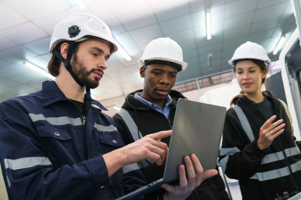 istock Multiracial tachnicial engineer training with robot arm 1622345726