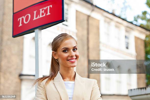 Female Real Estate Agent Stock Photo - Download Image Now - 20-24 Years, Adult, Adults Only