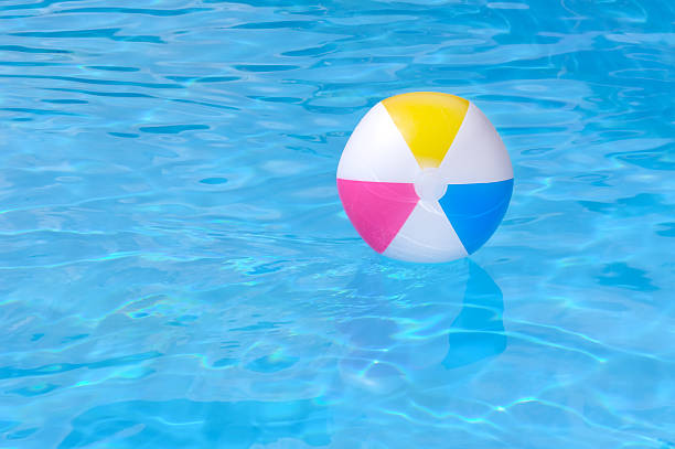 istock Inflatable ball in swimming pool 162235609