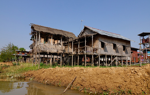 Inle, Myanmar - Feb 15, 2016. Traditional wooden stilt houses at the Inle lake, Shan state, Myanmar. The people of Inle Lake (called Intha) live in four cities bordering the lake.