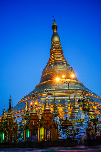 Yangon, Myanmar - Oct 16, 2015. Shwedagon Paya Pagoda at twilight in Yangon, Myanmar. Shwedagon is the Myanmer famous sacred place and tourist attraction landmark in Yangon, Myanmar.