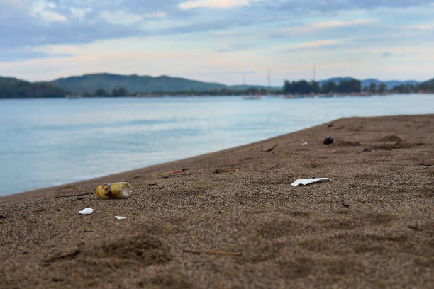 garbage on the beach in indonesia stock photo