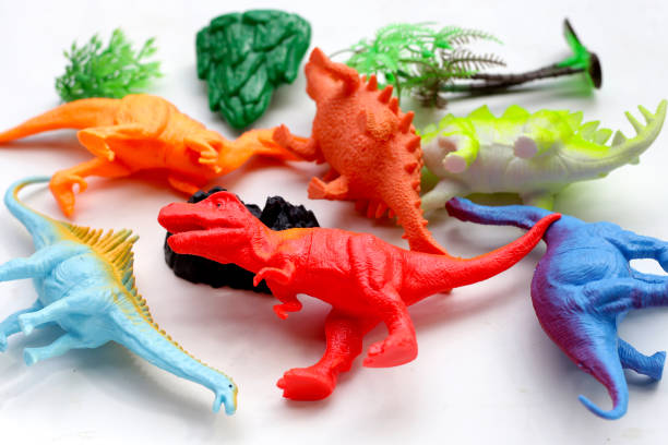 istock Plastic dinosaur toys on white background. 1622405315
