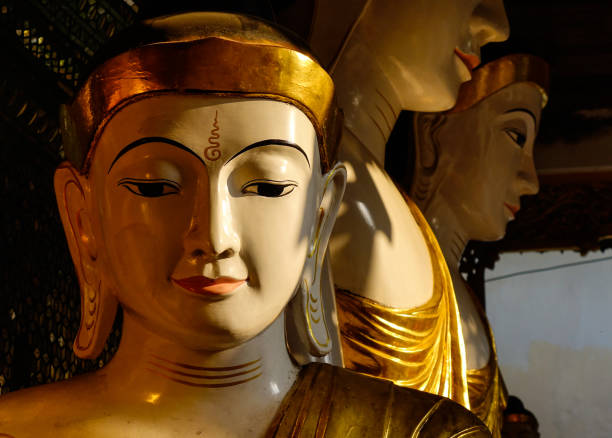 Buddha Statues at Shwedagon Pagoda in Yangon (Rangoon), Myanmar.