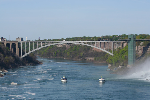 Niagara Falls, ON, Canada-May 21,2007:The Rainbow Bridge and Maid of The Mist Tour Boats