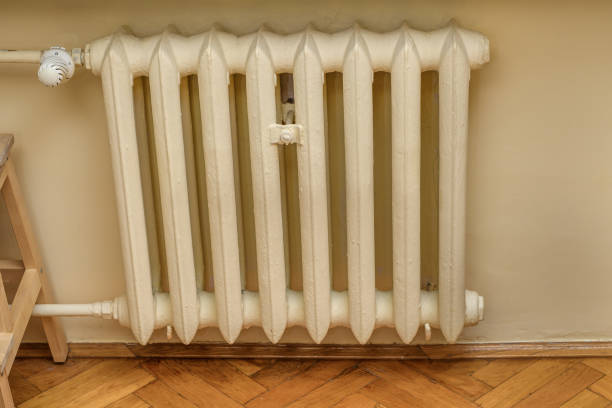 istock Old cast iron radiator, central heating in the block 1622425099