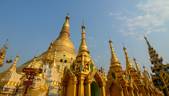 Shwedagon Pagoda under blue sky in Yangon, Myanmar.