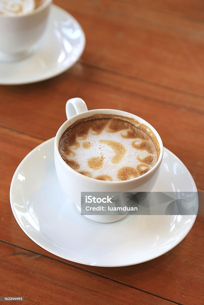 Cappuccino Cup of cappuccino with smiley face. Anthropomorphic Smiley Face Stock Photo