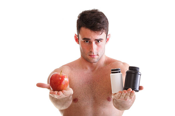 비타민 또는 환약 끌어오기 태블릿 메시지함 보조제 남자 격리됨에 - creatine nutritional supplement men human muscle 뉴스 사진 이미지