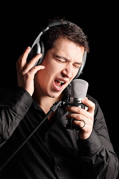 istock Male singer performing a song 162244674