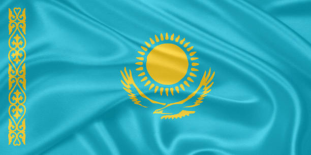 flag of Kazakhstan flag of Kazakhstan waving with highly detailed textile texture pattern steppe eagle aquila nipalensis stock pictures, royalty-free photos & images