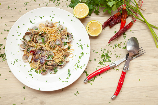 Spaghetti alle vongole in bianco, pasta with clams,served on plate