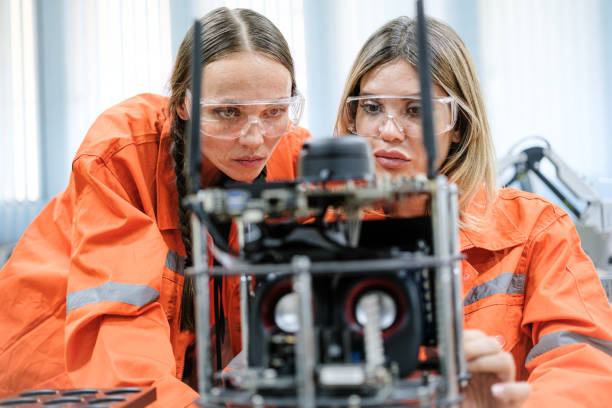 istock Multiracial tachnicial engineer training with robot arm 1622483177
