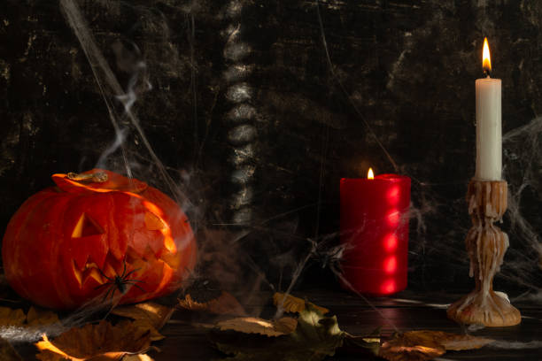 istock Halloween decorations in smoke, pumpkin, candles, Jack's lantern from pumpkin 1622506193