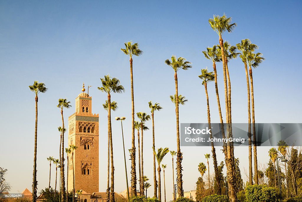 Marrakech Koutoubia Koutoubia minaret in Marrakech with palm trees. Marrakesh Stock Photo