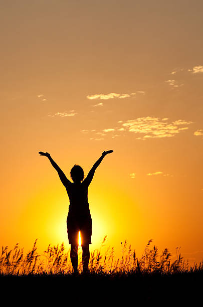 istock Woman Lifting Hands to the Sky 162253530