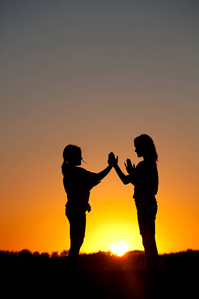 istock Two Young Girls Playing at Sunset 162253603