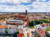 Panoramic view of St. Mary’s Church and cityscape of Gdansk Old town from above.