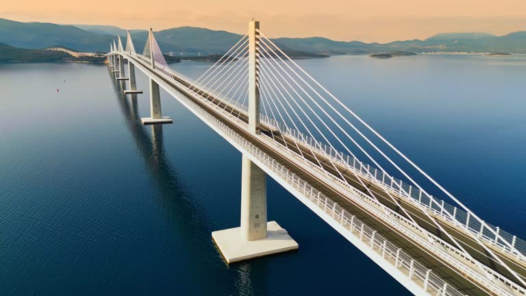 AERIAL VIEW of Peljesac bridge passing over Bay of Mali Ston in Croatia